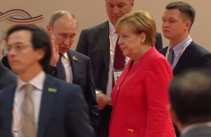 Angela Merkel şi Vladimir Putin la summitul G20